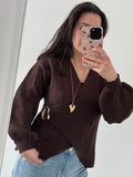 Blouse met V-hals en overslagdetail