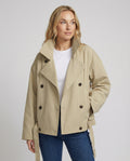 Unisex trenchcoat met dubbele knoopsluiting, oversized pasvorm en retrolook – Beige