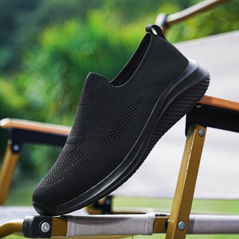 Dames slip-on sneakers met gebreid bovenwerk – Zwart-wit