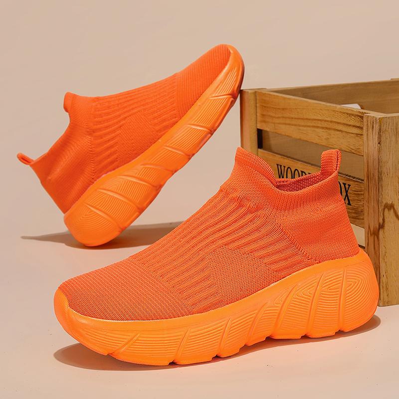 Dames sneakers met gebreid bovenwerk en dempende zool – Oranje