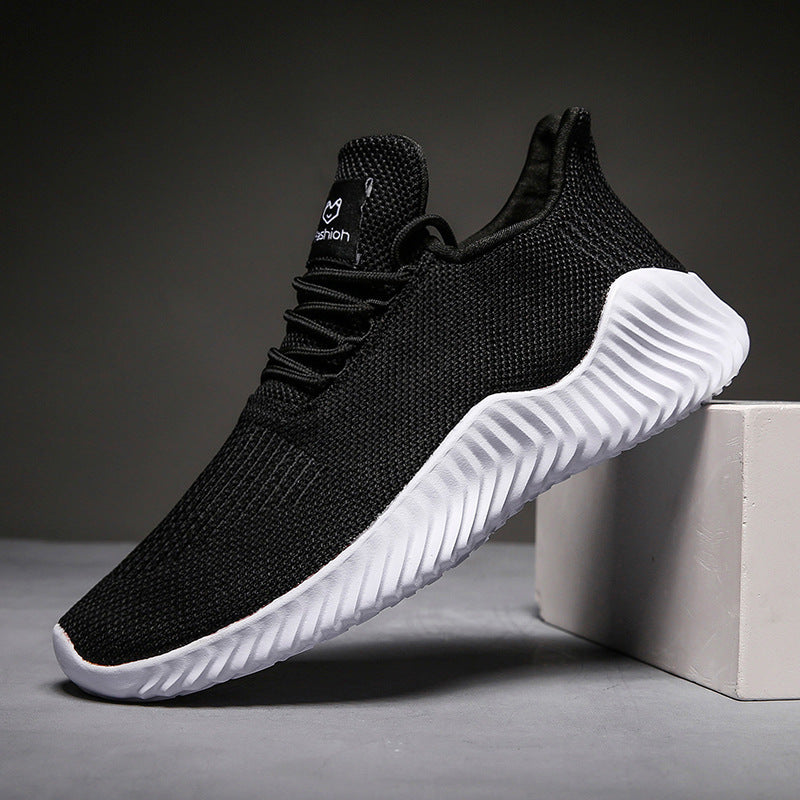 Dames sneakers met flexibele zool en gebreid bovenwerk – Zwart