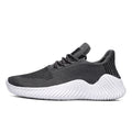 Dames sneakers met flexibele zool en gebreid bovenwerk – Zwart